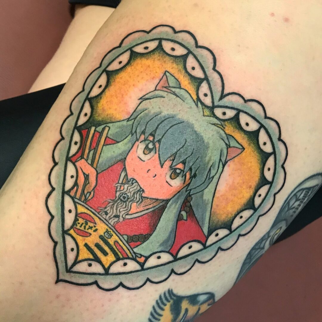 A tattoo of a cat girl with a heart.