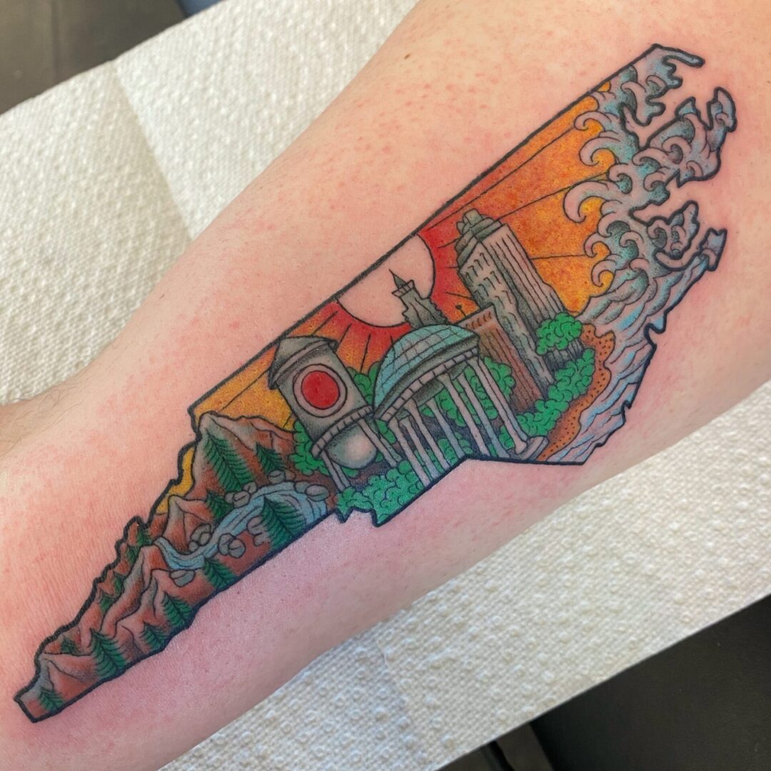 A tattoo of the state of virginia with an orange and green background.
