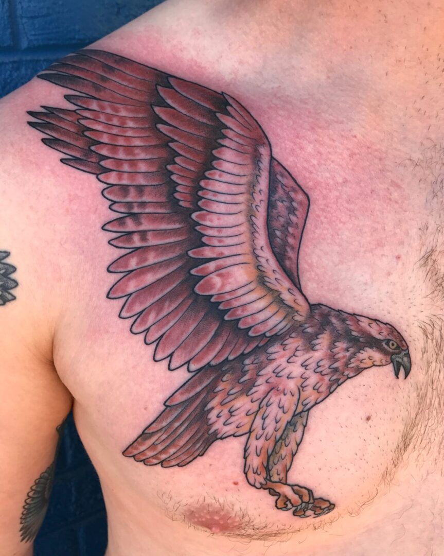 A tattoo of an eagle on the chest